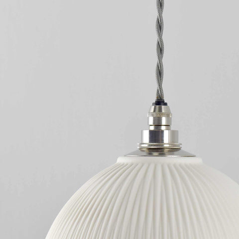 Denton Medium Ribbed ceramic bathroom pendant light with textured white shade and metal fixture hanging against gray background