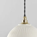 Denton Medium Ribbed ceramic pendant light with brass fitting and twisted cord for bathroom lighting