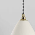 Langton Ceramic Shade bathroom pendant light with elegant handcrafted white ceramic shade and brass fittings hanging from twisted cord