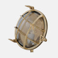 Wessex Bulkhead Wall Light satin brass nautical-inspired industrial wall and ceiling light with protective cage and frosted glass cover