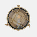 Wessex Bulkhead Wall Light in satin brass with nautical design and protective metal grid, suitable for indoor and outdoor use.