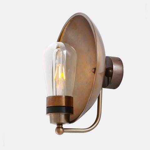 Chulainn Bathroom Dish Wall Light with antique brass dish shade and exposed bulb on curved arm, moisture-resistant for bathroom use