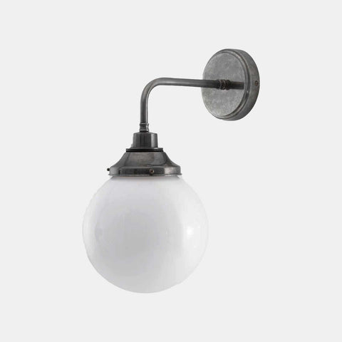 Laguna Bathroom Wall Light with opal glass shade and metal arm for wet zones.
