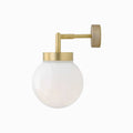 Jordan White Glass Wall-mounted light fixture with gold arm and white glass shade on a white background