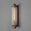 Louise Bathroom Wall Light with antique brass finish and reeded glass shade for warm, diffused lighting in bathrooms or vanity areas