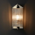 Baby Roddy Bathroom wall light with clear glass rods and polished metal fitting, ideal for bathroom mirror lighting.
