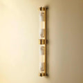 Pooky Rodtastic Bathroom Wall Light in brass finish with elongated vertical design and clear rods