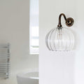 Soho medium ribbed glass shade bathroom wall light with antique bronze fixture and ribbed clear glass shade