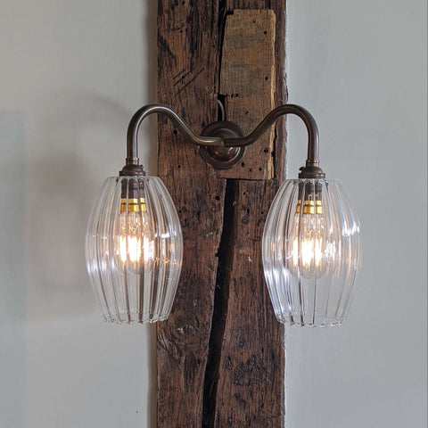 Camber Medium Ribbed Glass Shade Double Arm Wall Light with double swan neck arms for warm, versatile home lighting