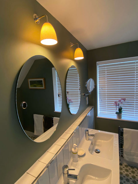 Hartlip small ribbed ceramic shade wall light with warm diffused glow and handcrafted UK design