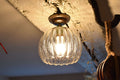 Soho Medium Ribbed Glass Shade Flush Ceiling Light on a wooden beam