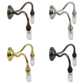 Rye Small Clear Glass Shade bathroom wall light in four finishes with sleek curved arm and splashproof design