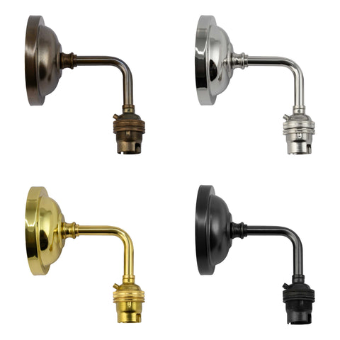 Four variations of the Brook Small Ribbed Glass Shade Wall Light in antique brass, polished chrome, polished brass, and matte black finishes without shades attached