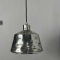 Chehoma Nickel Bell Pendant Light with hammered brushed nickel finish hanging from black cord