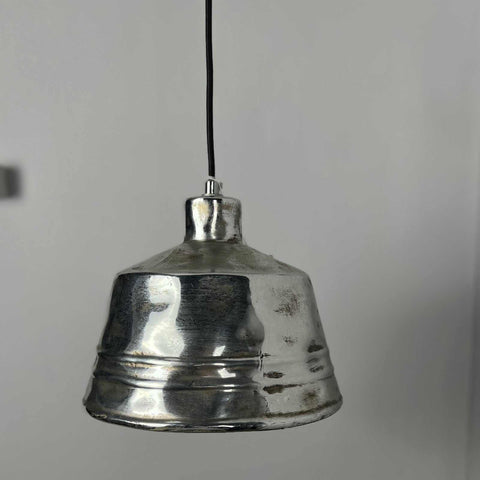 Chehoma Nickel Bell Pendant Light with hammered brushed nickel finish hanging from black cord