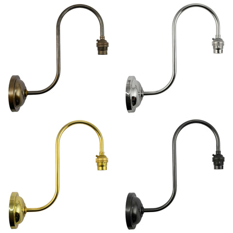 Bodium Clear Glass Shade Wall Light in multiple metal finishes.