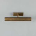 Cambridge Adjustable Brass Picture Light in reeded brass with adjustable arm for artwork lighting