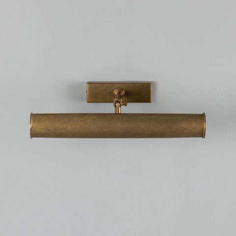Cambridge Adjustable Brass Picture Light in reeded brass with adjustable arm for artwork lighting