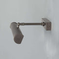 Cambridge Adjustable Brass Picture Light in reeded brass with adjustable arm for art and gallery wall lighting