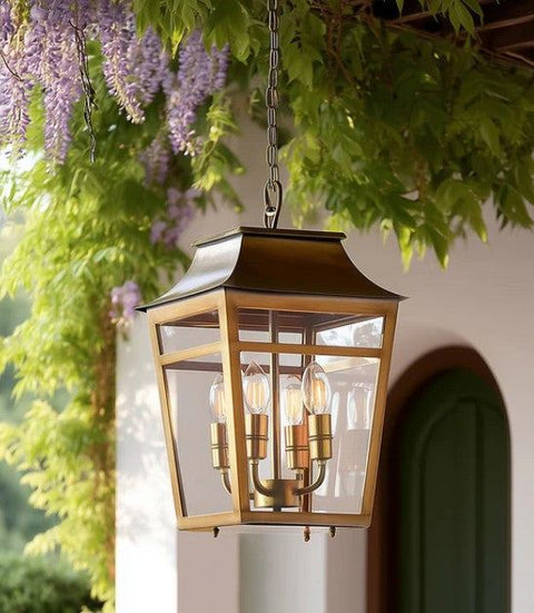 Majorelle Outdoor Pendant Light in brass in an outdoor space