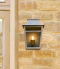Majorelle IP44 outdoor wall lantern in antiqued brass for exterior lighting