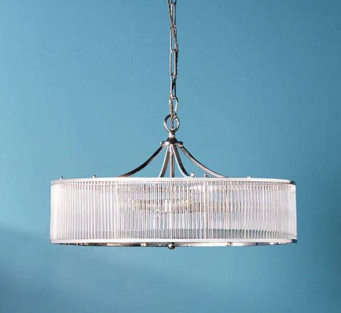 Pooky Athena Chandelier elegant brass frame pendant light with glass rods against blue background