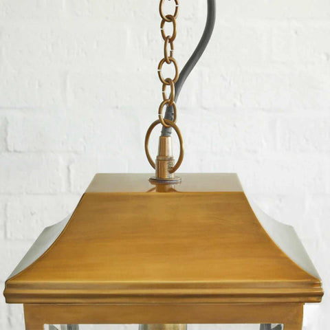 Pooky Crail Lantern outdoor ceiling light in solid brass with Victorian horse carriage design and beveled glass panels