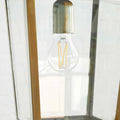 Pooky Crail Lantern outdoor ceiling light with solid brass frame and bevelled glass panels.