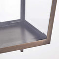 Close-up of Pooky Crail Lantern outdoor ceiling light with brass frame and bevelled glass panels