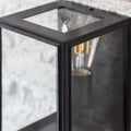 Belgrave Outdoor Lantern small black metal and glass outdoor wall light with modern design and exposed filament bulb