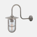 Denham Outdoor Swan Neck Wall Light in antique silver finish with brass cage and glass shade for durable outdoor lighting