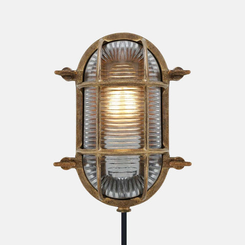 Ruben Small Outdoor Wall Light weatherproof vintage ship-inspired bulkhead light with protective metal cage and ribbed glass shade