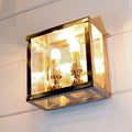 Chiswick Outdoor Double Lamp wall light with polished reflective metal frame and two bulbs for elegant indoor and outdoor illumination