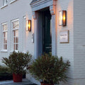 Large Chiswick Outdoor Wall Light illuminating entrance of modern home exterior