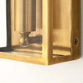Close-up of Pooky Crail Wall Light in solid brass with lantern-inspired design and weatherproof finish