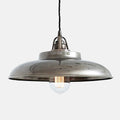 Telal Pendant Light with vintage braided cord and industrial-style metal shade hanging from ceiling with exposed bulb