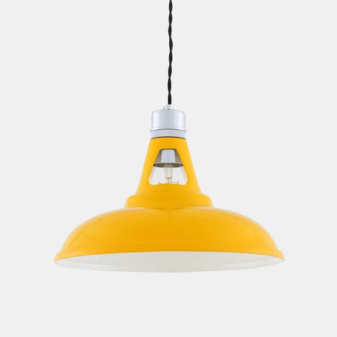 Yellow Vienna Pendant Light with industrial design and exposed bulb hanging from twisted black cord
