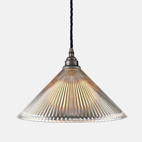 Rebell Prismatic Glass Pendant Light with prismatic glass shade and industrial design for ambient lighting.