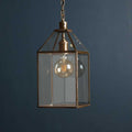 Pooky Carrington Lantern large vintage style pendant light with antique brass frame and glass panels hanging from chain