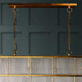 Pooky Odin Chandelier pendant light with over 400 handcrafted glass rods and double-tiered brass frame in Art Deco style