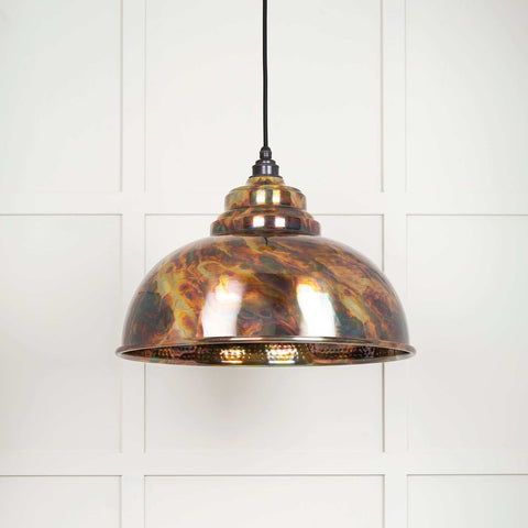 Brampton burnished pendant light with hand-burnished brass finish and hammered interior, hanging ceiling lamp with warm dappled glow.