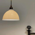 Denton Medium Ribbed ceramic pendant light with handcrafted porcelain shade and warm soft light diffusion