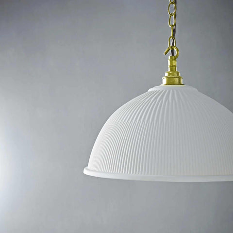 Denton large ribbed ceramic shade pendant light with brass chain and white textured porcelain finish