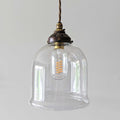 Hythe Clear Hand-Blown Glass Pendant Light with bell-shaped clear glass shade and vintage filament bulb