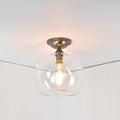Soho medium clear glass globe flush ceiling light with handblown shade and brass fixture