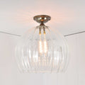 Soho extra large ribbed glass globe flush ceiling light with clear hand-blown glass in a contemporary design.