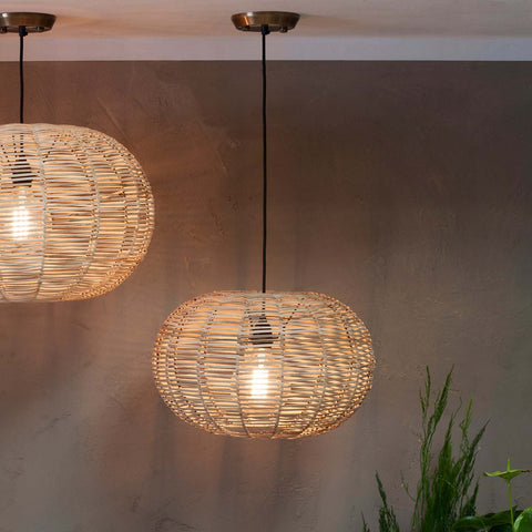 Nkuku Noko Wicker small round pendant light with natural woven wicker design and warm illumination