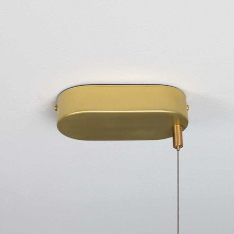 Fairfield Contemporary Brass LED Linear Pendant ceiling light hanging over kitchen island