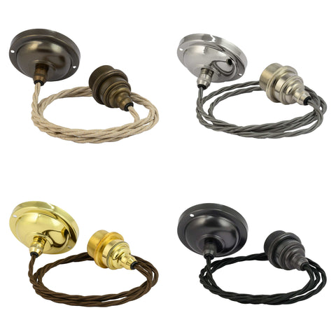 Four Denton Medium Ribbed ceramic pendant light ceiling fittings with twisted cords in brass, antique brass, chrome, and black finishes.