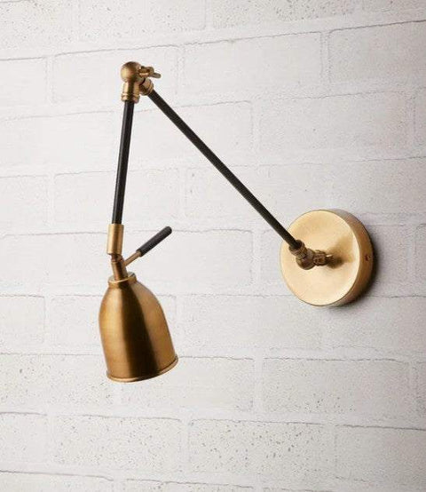 Pooky Pick Brass Wall Light with adjustable brass arm and solid brass hood, ideal for bedside reading, task lighting, and stylish interior wall illumination.